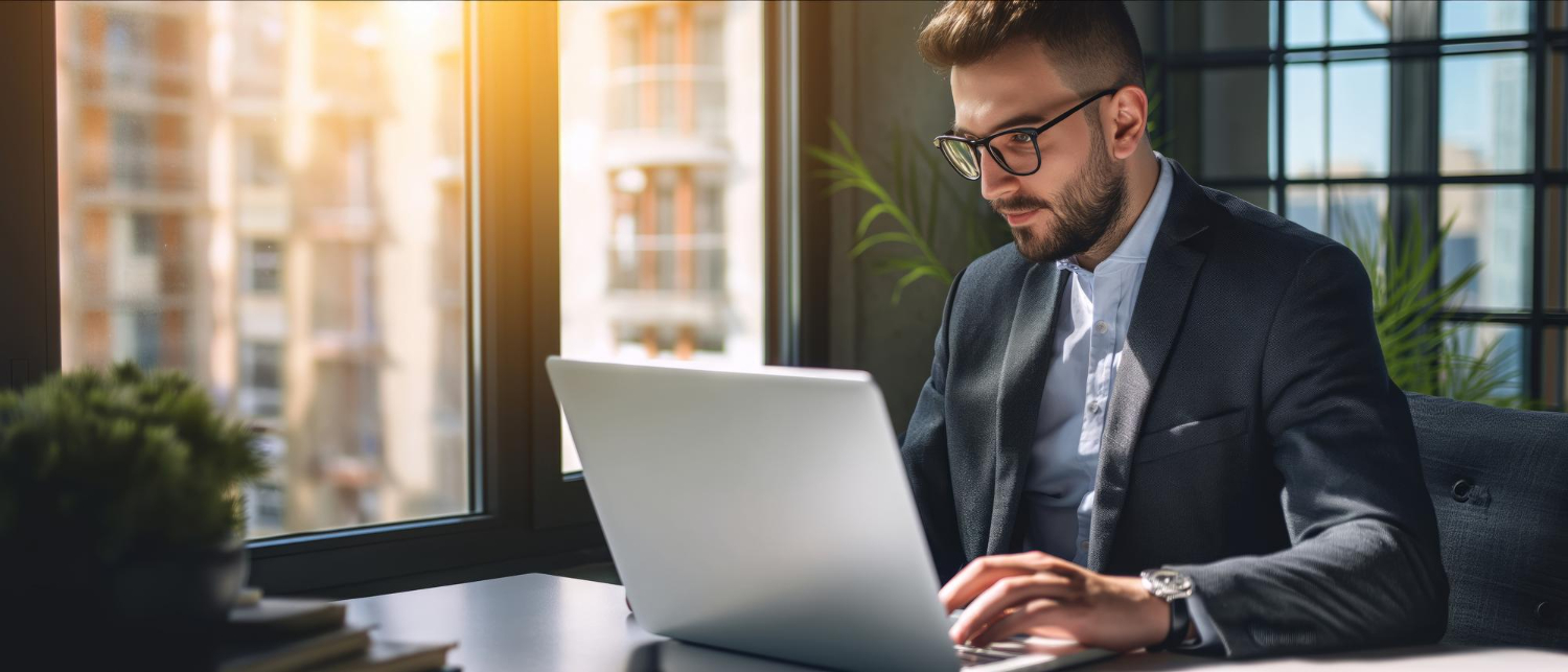 Dynamics 365 consultant working on laptop